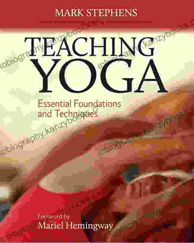 A Book Titled 'Teaching Yoga Essential Structures And Strategies' On A Yoga Mat. Teaching Yoga: Essential Structures And Strategies