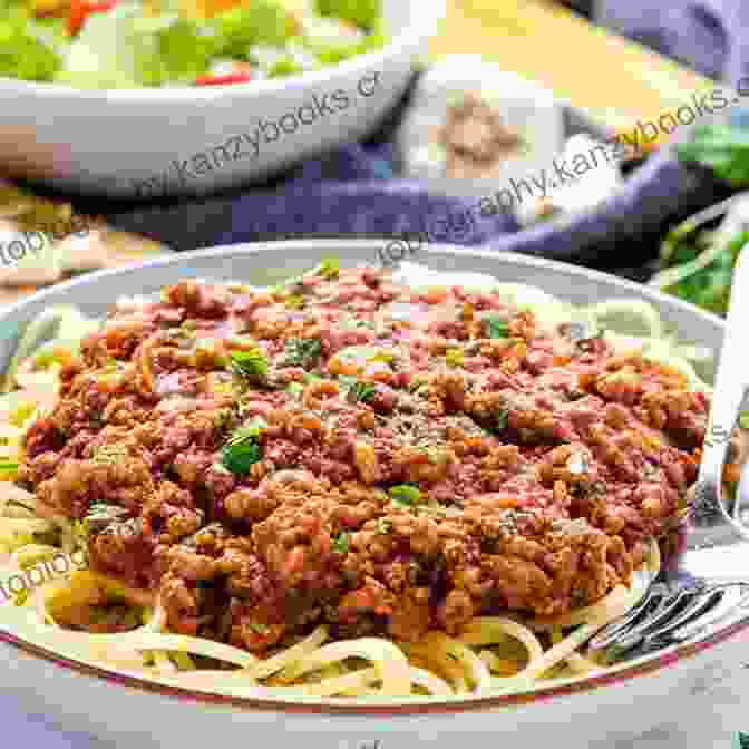 A Hearty Plate Of Spaghetti Generously Topped With A Rich Meat Sauce, Grated Parmesan Cheese, And Fresh Parsley. Healthy And Homemade: 40 Kid Pleasing Recipes