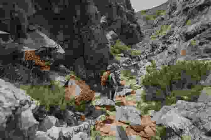 A Hiker Traversing The Challenging Terrain Of Great Gable, With Stunning Views Of The Surrounding Fells Walking The Lake District Fells Borrowdale: Scafell Pike Catbells Great Gable And The Derwentwater Fells