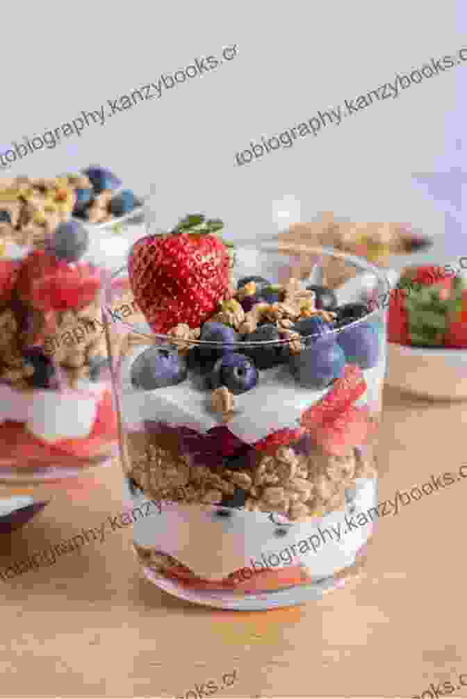 Glass Parfait Layered With Greek Yogurt, Granola, And Fresh Berries Eggs For Breakfast: Delicious Healthy Recipes To Jump Start Your Day: A Chef S Guide To Cooking Eggs With Over 50 Easy To Follow Recipes